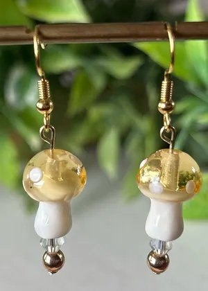 Handmade yellow mushroom + hematite drop earrings in gold thumbnail 1