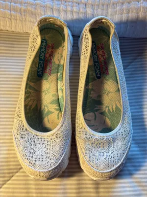 Skechers Sweet pea White Lace Memory Foam Slip-ons. thumbnail 1