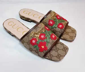GUCCI Jolie GG logo supermen floral tiger embroidered leather slides sandals thumbnail 1