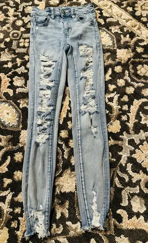 American Eagle Next Level Stretch Super Distressed Jeans size 0 thumbnail 2