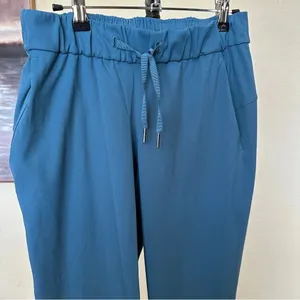 Lululemon On the Fly 7/8 Pant -‎ Size 4 either code blue or petrol blue pants thumbnail 10