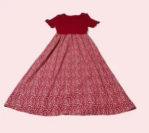 Stylish red maxi dress with a solid short-sleeve bodice and a patterned bottom thumbnail 1