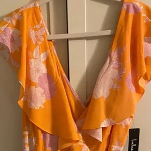 Lulu's Size XL Garden of Joy Floral Ruffled Wrap Dress w/Asymmetrical Hem NWT thumbnail 9