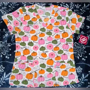 NWT! Divine Stretch Blessing Season Graphic Print Scrub Top 19” P2P thumbnail 1