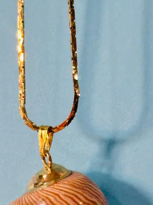 Gold Layered Necklace with Beige Swirl Pendant thumbnail 4