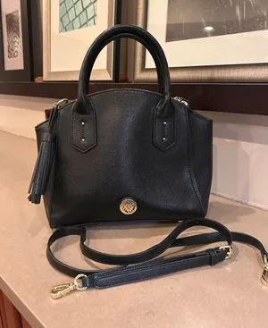 Anne Klein Structured Black Leather Top-Handle Satchel with Tassel Accent thumbnail 1