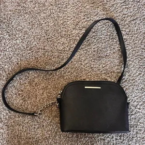 Black Steve Madden crossbody bag with silver accents thumbnail 1