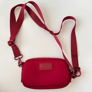 DAGNE DOVER x SEPHORA Limited Edition Mara Phone Sling Crossbody Bag Burgundy thumbnail 1