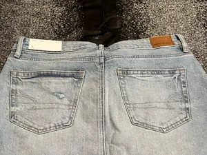 Womens sz8 NWT American Eagle High-Waisted Denim Mini Skirt Light Wash Raw Hem thumbnail 6