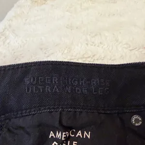 American Eagle Super High Rise Ultra Wide Leg Black Whiskering Fading Size 12R thumbnail 5