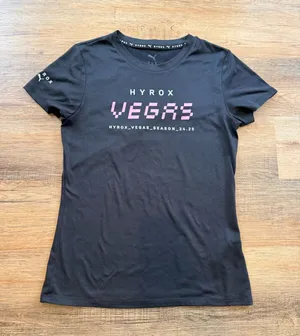 Puma Women’s Black Tee with Pink VEGAS Graphic thumbnail 1
