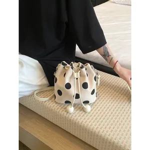 Chic Carryalls Polka Dot Drawstring Bucket Crossbody Bag thumbnail 2