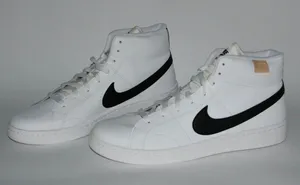 Nike white leather high tops with black swoosh thumbnail 1