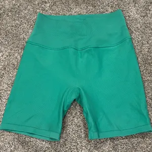 Mindful Movement Green Ribbed High-Waisted Seamless Biker Shorts thumbnail 1