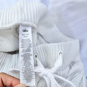 Alo Yoga | Xxs Muse Sweatshirt In Ivory Ribbed Jogger High Rise Ankle thumbnail 9