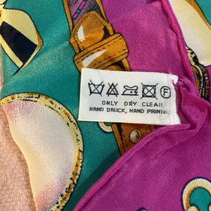 Vintage 100% silk scarf by Cordello. Motif features items from a vanity table. thumbnail 4
