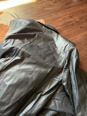 Vintage Black leather Rock Creek trench coat size small The outer shell is 100% genuine leather The lining in Nylon! Missing 1 button on the right side in pictures 1-4 not noticeable or even a snag there!!! thumbnail 10