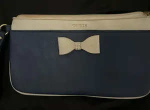 GUESS Navy & White Bow Wristlet Clutch thumbnail 1