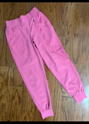 Climate Right by Cuddl Duds Pink Scrub Joggers - size Small. Pockets in front that includes 2 additional pockets. Gently warn & excellent condition. Measurements approximately 13” waist x 11” rise x 39” long. Non-smoking home. priced to sell at as is condition. Don’t like my price, make reasonable offer! And thank you for checking my closet. thumbnail 1