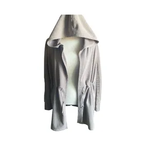 Beyond Yoga-On the go-Cozy Taupe Jacket-size large The first three stock photos are the actual color of the jacket, I had a hard time capturing the exact color in my pictures. Soft and warm taupe jacket. Ideal for comfort and style Open front Cinched waist Hooded Side pockets 67% cotton and 33% polyester Excellent condition thumbnail 8