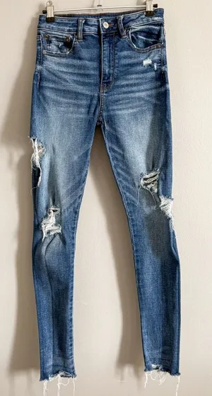 American Eagle Medium Wash Super High Rise Distressed Jegging Size 2 thumbnail 1