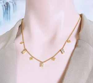 Dainty Clovers & CZ Charms Gold Necklace thumbnail 9