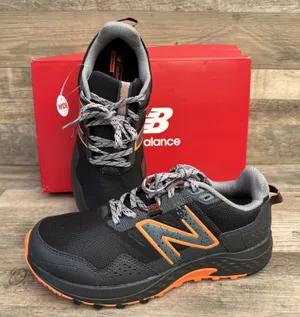 New Balance Men 8, Women 9.5 WIDE 4E Black Orange Sneakers 410v8 Low Trail Shoes thumbnail 1