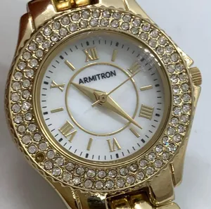 Armitron 27mm ladies Quartz analog WR watch gold tone MOP dial 6.5”-7” thumbnail 2