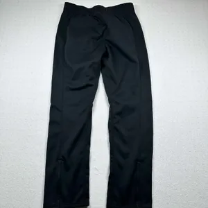 Nike Therma-FIT Women’s Sweatpants Medium Black Fleece Lined Zip Ankle Athletic thumbnail 2