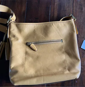 Coach Legacy Messenger Bag in Mustard Yellow thumbnail 1