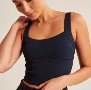 Abercrombie Stylish navy tank top. Features adjustable straps. Perfect for casual wear. Top is ticketed as medium but runs like an XL thumbnail 1