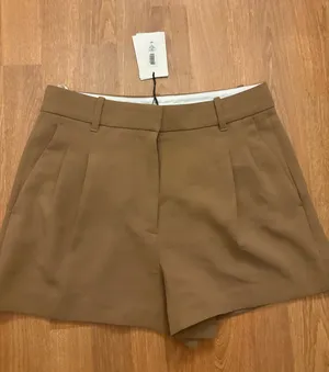 Aritzia Effortless Mini Shorts - Desert Sand size 8 thumbnail 1