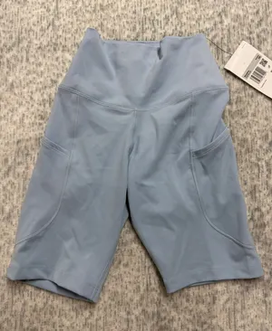 Nike‎ One Womens High Rise 8 Inch Biker Shorts Light Blue FZ6758-440 XS…. thumbnail 1