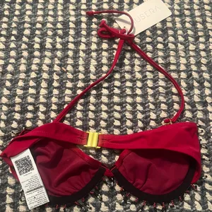 MUSÉRA red beaded bikini topwith gold buckle detail on the back #beaded #buckle Size small but fits like an XS thumbnail 4