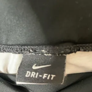 Nike Dri Fit Black Gray Athletic Shorts Swoosh Logo Women’s Large Excellent Cond thumbnail 7