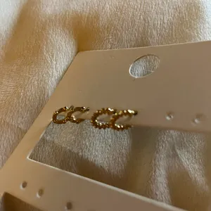 Mini Hoop Earrings Gold thumbnail 3