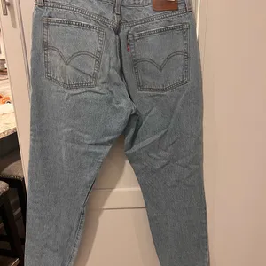 Levi's Light‎ Blue Denim Jeans with Brown Patch thumbnail 2