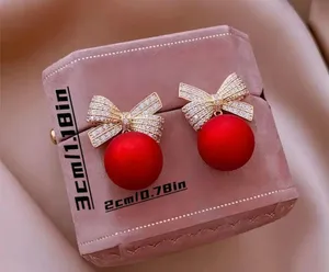 Gorgeous Holiday Bow with Red Shiny Ball Earrings thumbnail 3