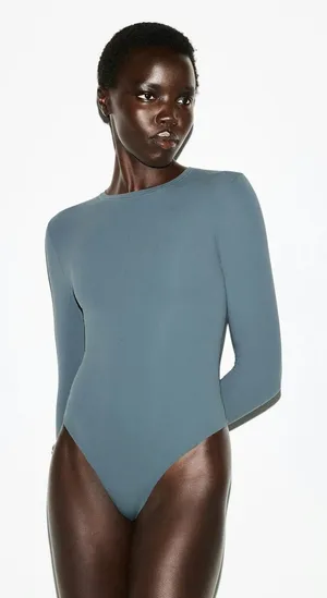 SKIMS LONG SLEEVE CREW NECK BODYSUIT, Size Large, LIMITED EDITION Zircon, $70 thumbnail 1