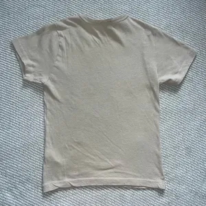 Urban Outfitters Bdg Tan Floral Graphic “One Of A Kind” Crop Baby Tee Sz Sm thumbnail 2