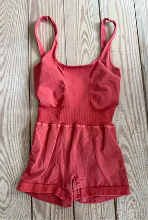 Free People Movement Good Karma Runsie in a washed red color xs/s thumbnail 1