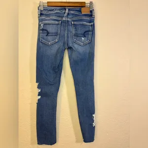 American Eagle Outfitters Distressed Ripped Blue Skinny Jeans Size 0 thumbnail 2