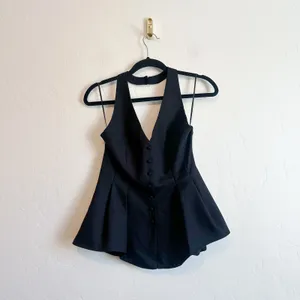 Reformation | Auli Halter Wool-Blend Peplum Vest Top in Black | size 2 thumbnail 4
