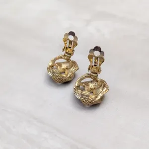 Vintage Clip On Earrings Gold Tone Patterned Knot Design - Fair Condition thumbnail 7