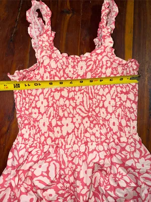 pink and white floral smocked sundress from the boutique brand Versona thumbnail 5