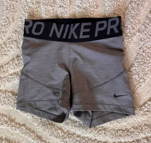Gray Nike Pros thumbnail 1