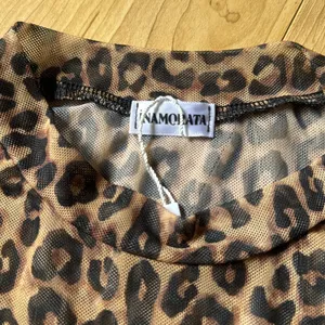 Brown Leopard Print Short Sleeve mesh top Size XS thumbnail 2