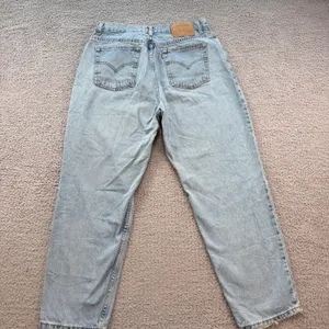 Vintage Levis 550 Relaxed Fit Tapered Leg Light Wash Jeans 16S 31W Womens Blue thumbnail 2