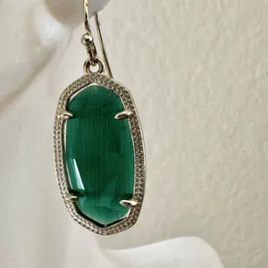 Kendra Scott Dani earrings in gold and emerald cat's eye thumbnail 3
