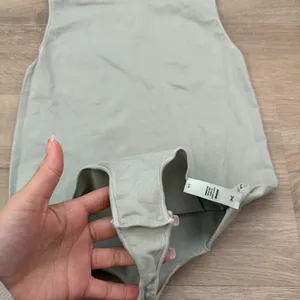 Skims Essential Bodysuit in Mineral Green thumbnail 7